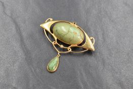 A 15ct gold Art Nouveau Murrle Bennett & Co. turquoise and seed pearl set brooch, the sinuous