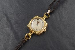 An 18ct gold wristwatch, the cream dial having Arabic numerals, in a square case on a leather strap,