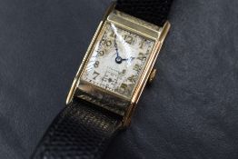 A 9ct gold Crusader wristwatch, the rectangular silver tone dial having Arabic numerals and