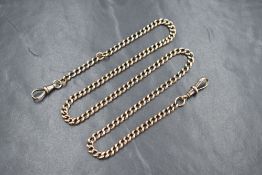 A 9ct gold curb link Albert watch chain, having two dog clips, the chain marked 375 and one dog