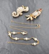 A gold plated costume jewellery brooch by Grosse in the form of a sea horse having cubic zirconia