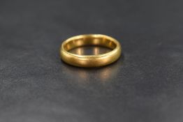 A 22ct gold wedding band of plain form, size L/M & 5.8g