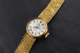 A 9ct gold Omega wristwatch, the champagne dial having baton numerals, the case marked 375 and