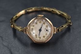 A ladies vintage rose gold wrist watch having Arabic numeral dial with subsidiary seconds on a