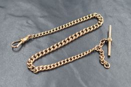 A 9ct gold graduated curb link Albert watch chain, having T-bar and dog clip, marked 9ct, 25cm, 11.
