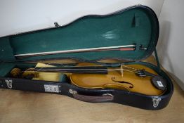 A traditional viola having one piece 16' shaped back, labelled internally Nicolas Amatus, Cremona