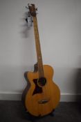 An as new Tanglewood electro acoustic bass guitar , left handed , model TW155A s/n YU140804043 (no