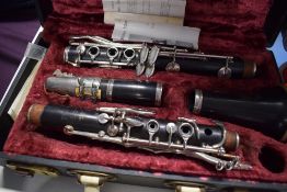A vintage Boosey & Hawkes clarinet, London Series 2-20, serial number 203596, in fitted case