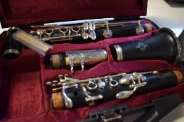 A vintage Buffet Crampon clarinet in fitted case and part antique clarinet or oboe