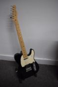 A USA Fender Telecaster in black serial number Z4204865 sold with Fender hardcase