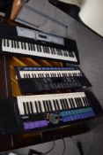 Three Yamaha keyboards, including Portasound PSS-680