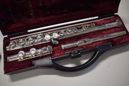 A Buffet Crampon silvered flute, stamped Coopers scale E , in fitted case