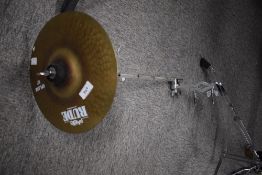 A Paiste Rude Cymbal, splash , 10 inch with fittings