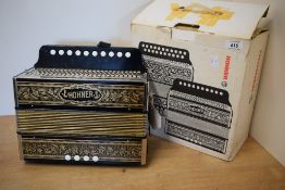 A Hohner Melodeon/Diatonic Accordion , model 1140 (C) , as new with box