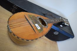 A traditional Neapolitan bowl back mandolin, partially labelled interior (napoli) , sold with case