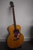 An Alvarez ABT60 Baritone acoustic guitar, professionally converted to electric with Fishman pick up