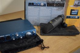 A Presonus AudioBox iTwo studio interface, hardly used , includes M7 condenser microphone but no
