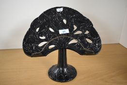 A 20th-century cast metal tabletop lectern in the style of 'Partridge in a Pear Tree,' unmarked,