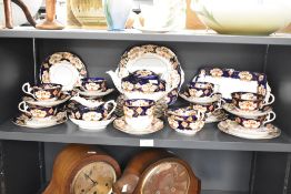 An early 20th-century Royal Albert crown china 'Heirloom' tea set, featuring a cobalt blue, deep