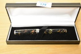 A boxed Sigma converter fill fountain pen in Olive Wood having Iridium Point Germany nib