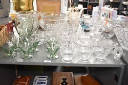 A late 20th-century mixed lot of crystal cut glassware, having varying decorative designs (44