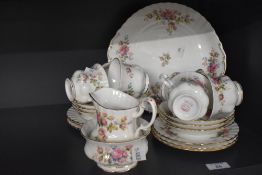 A mid 20th-century Royal Albert bone china 'Moss Rose' tea set, featuring a delicate floral