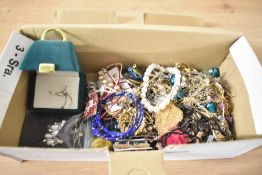 A collection of costume jewellery, including beaded jewellery, drop earrings, brooches and statement