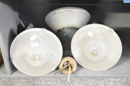 A quantity of three vintage Holophane glass pendant lights, (3), condition is consistent with age