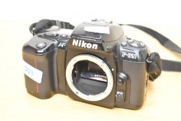 Nikon F601 35mm film camera.