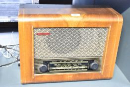 A mid 20th-century Pye 75 valve radio, 41cm, condition consistent with age and use.