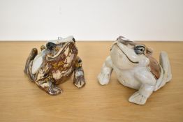 Two 20th-century art pottery ceramic frog figurines, each displaying decorative tertiary glazes with