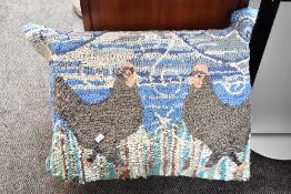 A contemporary hand crafted punch needle and burlap rug/tapestry, featuring a sweet pair of hens