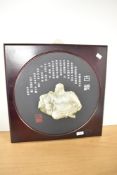 A contemporary Chinese resin and imitation wood hanging plaque of the Hotei Buddha, featuring