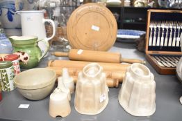 A selection of early 20th-century sundry kitchenware, to include two earthenware jelly moulds, a