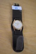 An Oris Super 17 Jewels wristwatch, the champagne dial having baton numerals and date aperture, on a