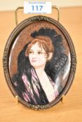 A Lucien Boullemeir (1877–1949) pottery portrait miniature depicting Dona Isabel de Porcel, after