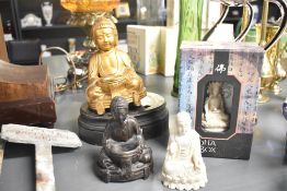 A quantity of modern Bhudda statues, to include a gilded example, and a white resin example, (4),