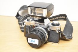 Olympus OM20 35mm film camera with an Olympus Zuiko 50mm f1.8 lens and an Olympus T20 electronic