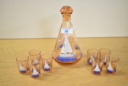 A 20th-century French Studio Glass decanter with eight shot glasses, of a peach-glass colouration