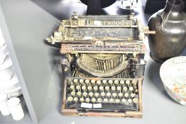 An early 20th-century American Underwood typewriter, 30cm, sold as is with condition consistent with