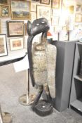 A large 20th-century West African carved Senufo Sejen Hornbill (Kalao bird), presumed to be from the