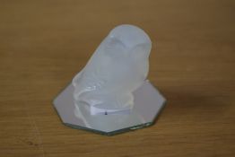 A 20th-century French Lalique opalescent glass owl, with a delicately rendered plumage and attentive