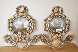Two late 19th to 20th century sailors' valentines, of anchor form, each adorned with a seashell