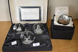 A set of three late 20th-century Caithness Glass paperweights, designed by Colin Terris, based on