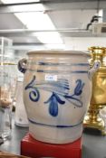 A large 20th century German Westerwald style stoneware two handled pot, having a decorated blue