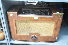 An early 20th-century Philips 785AX valve radio receiver, housed in a two-tone walnut veneered