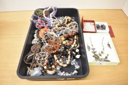 A large collection of costume jewellery, including amethyst, smoky quartz, jasper and rose quartz
