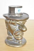 A late 19th to early 20th-century brass Mr Punch tobacco jar, featuring a removable hat that reveals