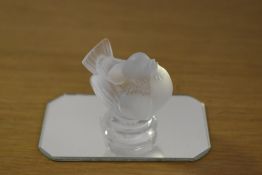 A 20th-century French Lalique frosted glass and clear crystal sparrow figurine, having a puffed