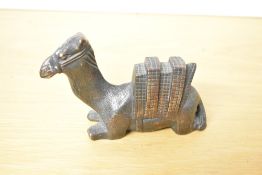 A 20th-century bronze recumbant camel sculpture, marked 'Made in England' to base, 14cm.